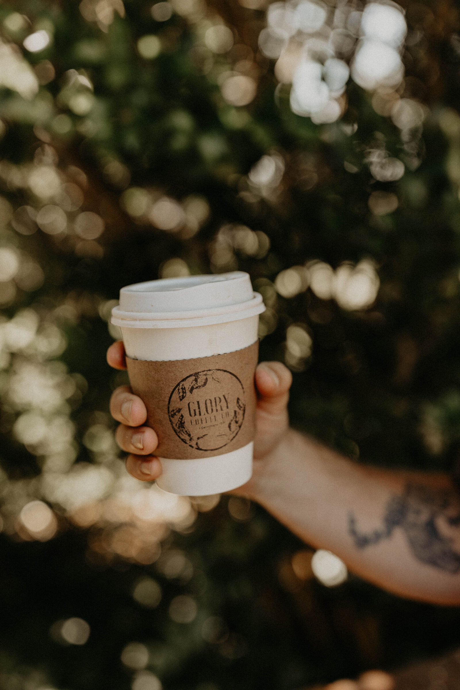 A Glory Coffee takeaway cup